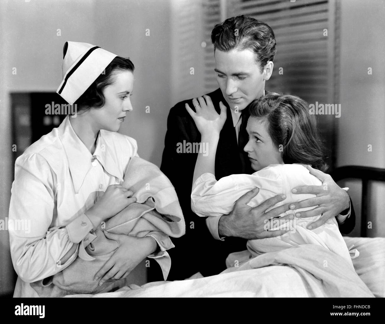 JEFFREY LYNN, GERALDINE FITZGERALD, è nato un bambino, 1939 Foto Stock