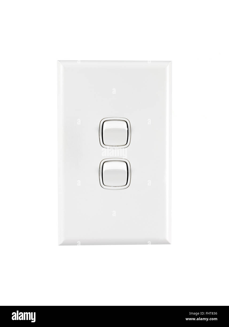 Un bianco doppio interruttore luce accesa Foto Stock