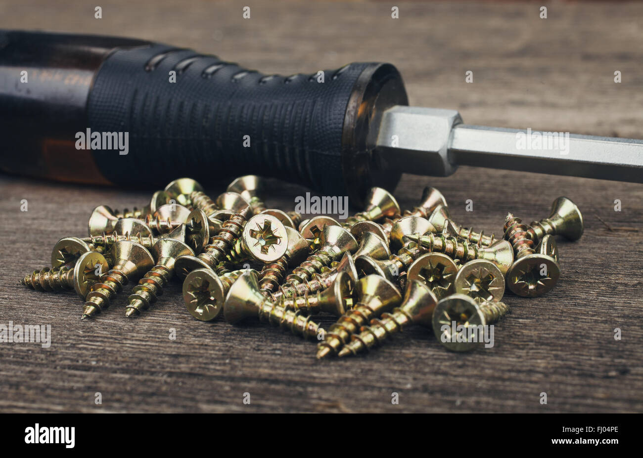 Cacciavite e viti Foto Stock