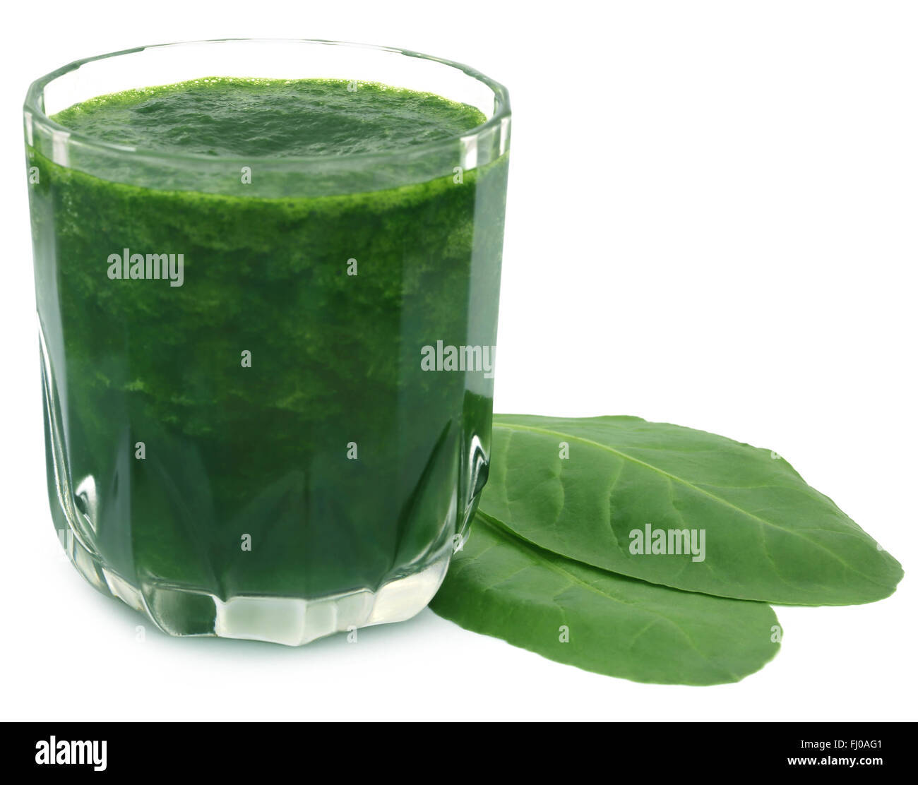 Primo piano di spinaci freschi succhi di frutta Foto Stock