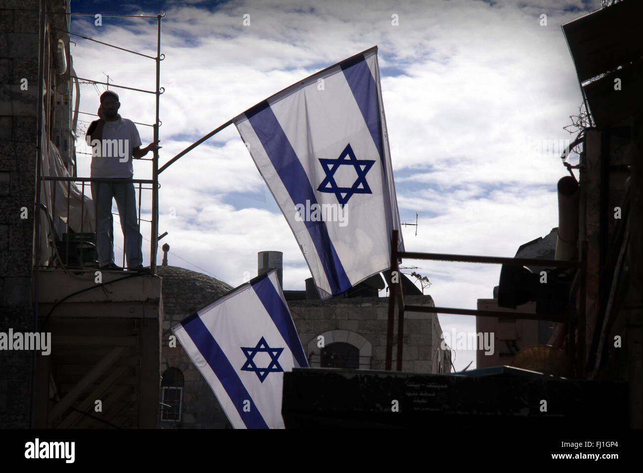 Nazionale Israeliano bandiera nella città vecchia di Gerusalemme , Israele Foto Stock