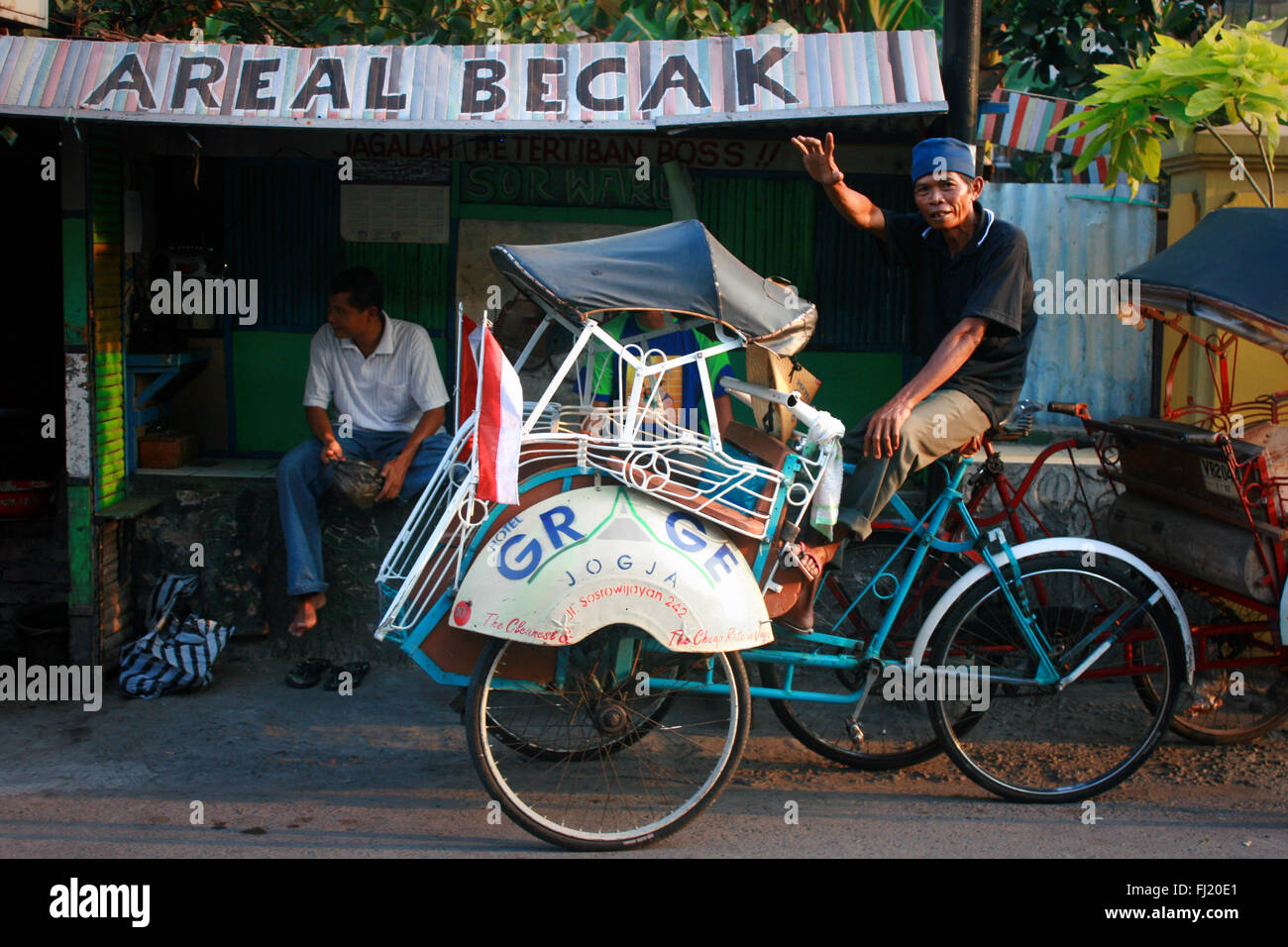 Driver Becak a Jakarta, Indonesia Foto Stock