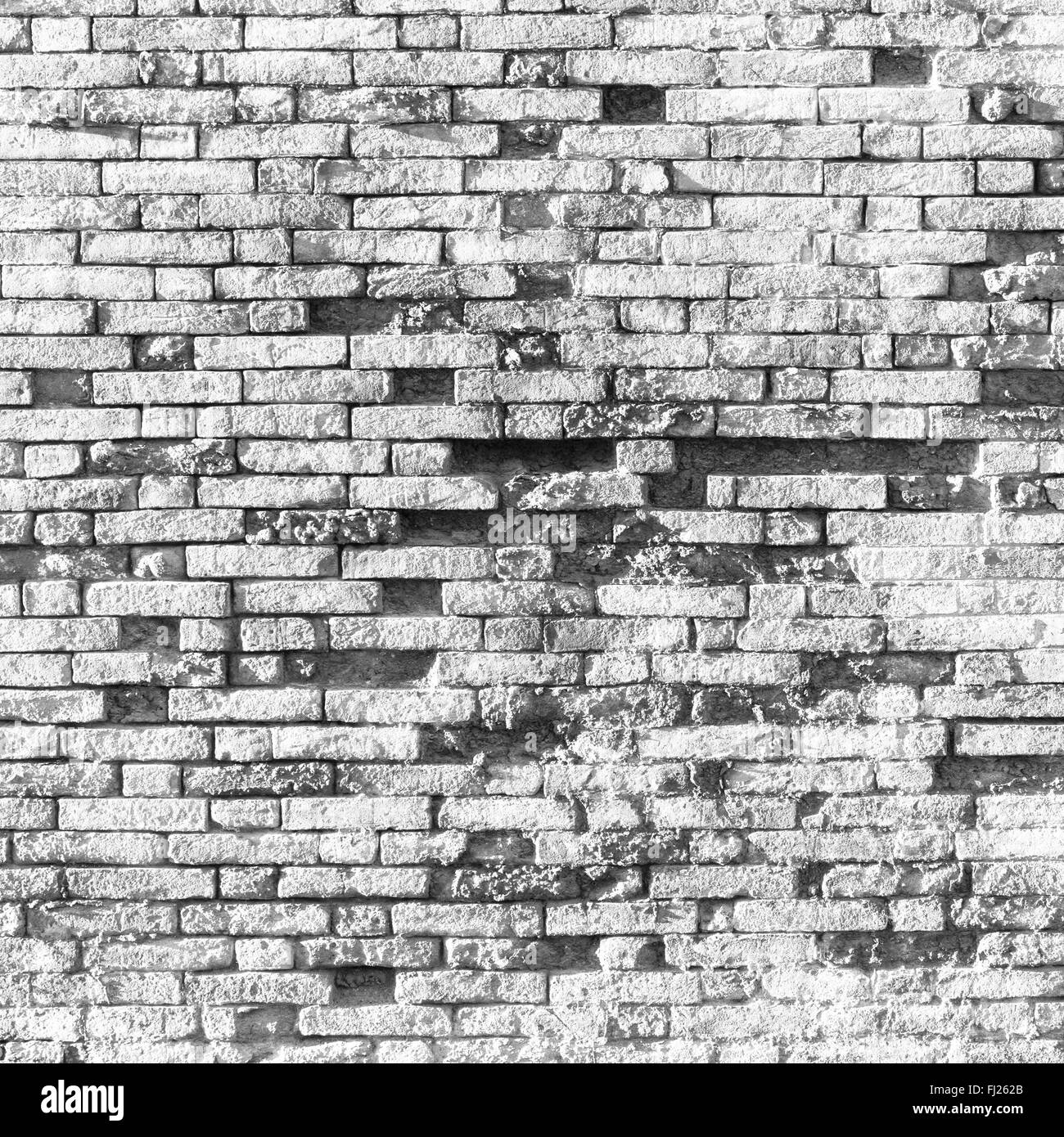 Vecchio grungy bianco muro di mattoni, quadrato texture di sfondo Foto Stock
