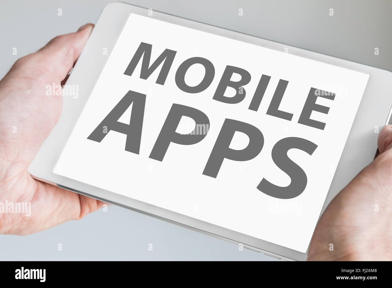 Mobile Apps il testo visualizzato sullo schermo a sfioramento della moderna tablet o smart device. Concetto per lo sviluppo di applicazioni per la telefonia mobile di d Foto Stock