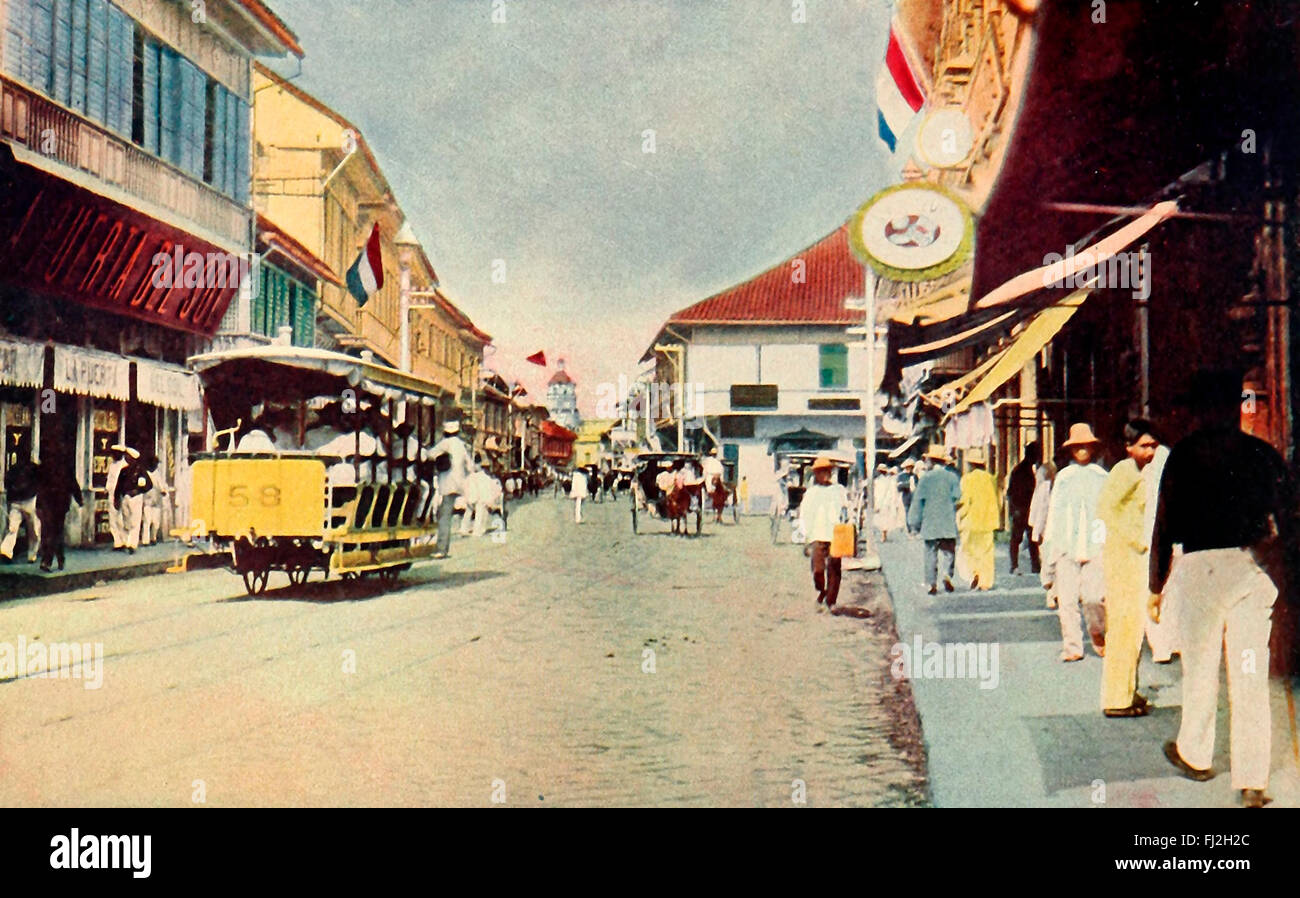 La Escolta, una attività principale arteria di Manila, Filippine, ha un automobile della via conosciuta come 'Carromatos', ogni vettura disegnata da un cavallo, come nei paesi europei. 1899 Foto Stock