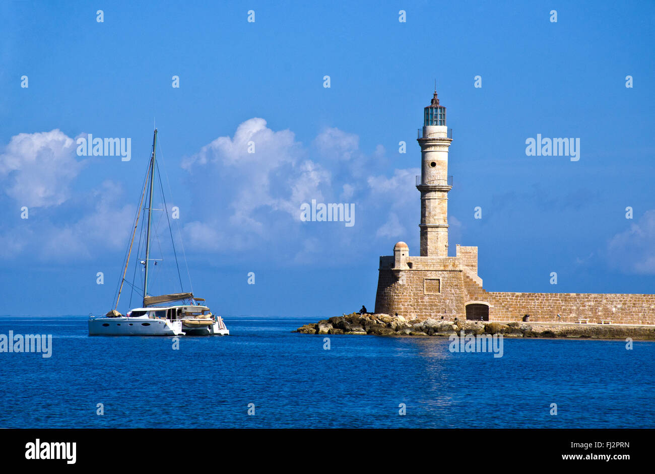 Faro di ingresso al porto Chania, isola di Creta, Grecia Foto Stock