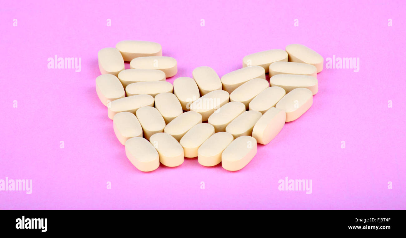 La terapia dell'hiv efavirenz su sfondo rosa Foto Stock