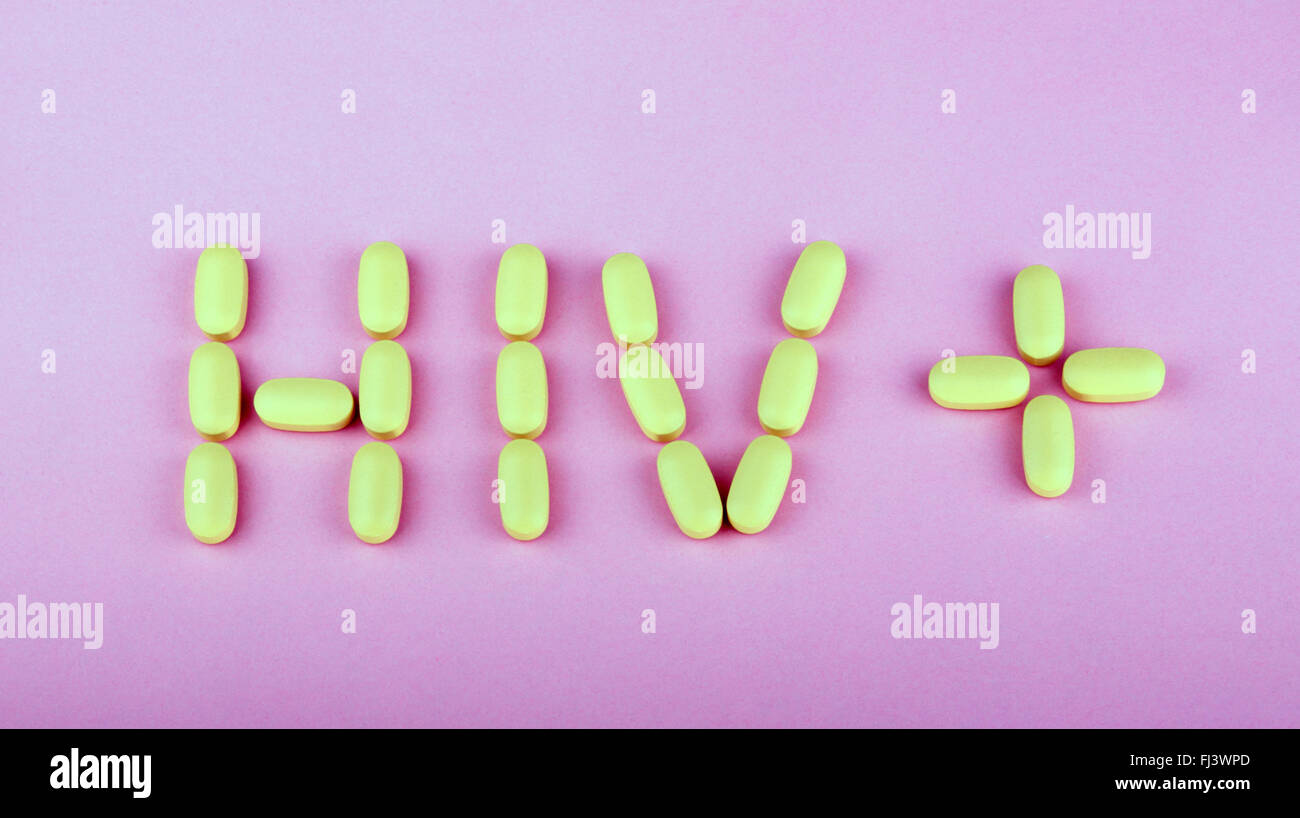 La terapia dell'hiv efavirenz su sfondo rosa Foto Stock