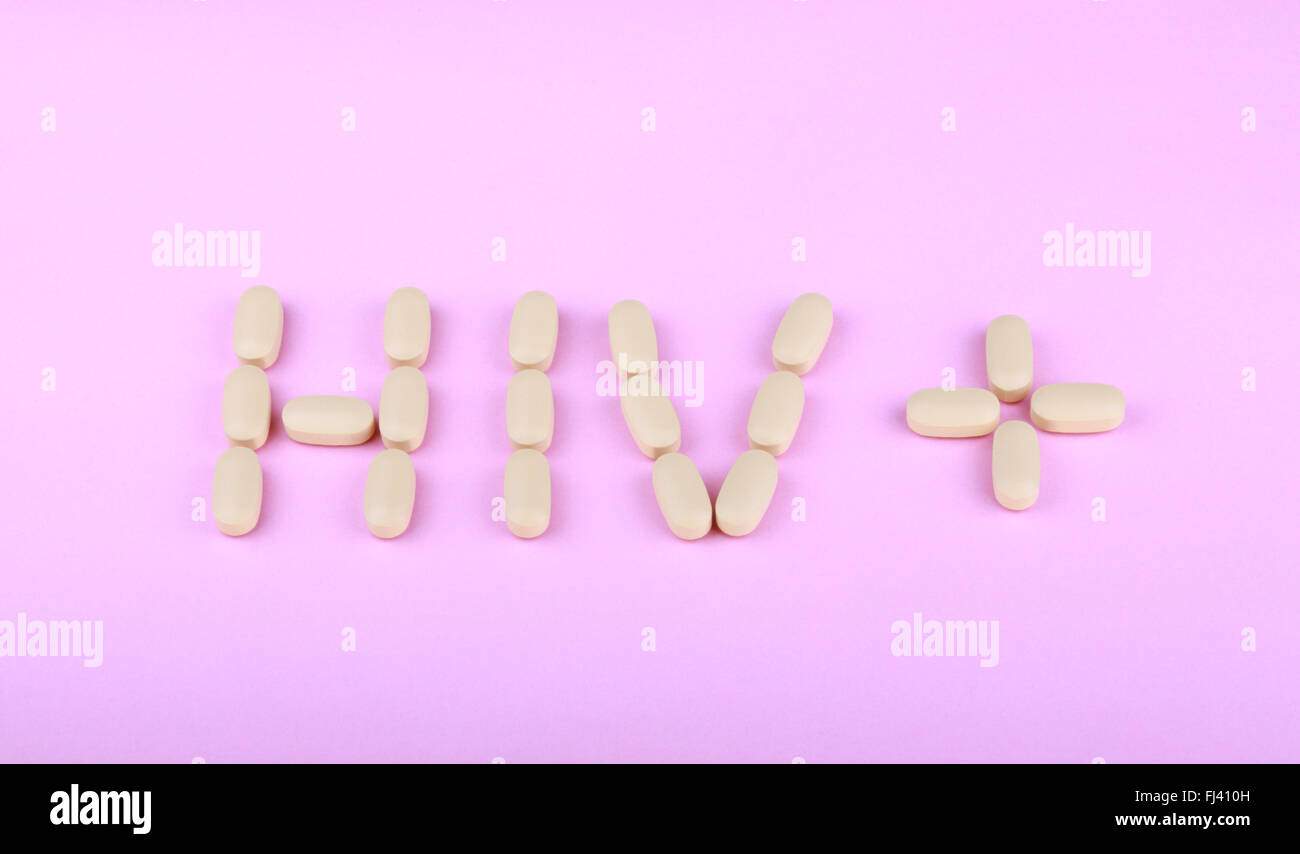 La terapia dell'hiv efavirenz su sfondo rosa Foto Stock