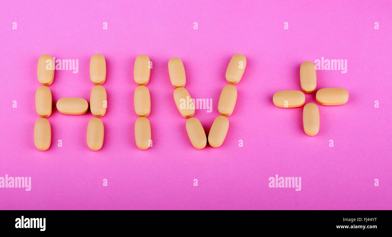 La terapia dell'hiv efavirenz su sfondo rosa Foto Stock