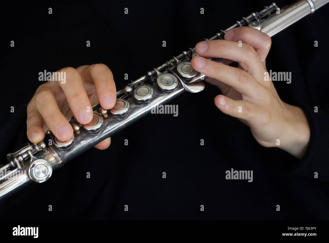 Flauto i giocatori le mani Foto Stock