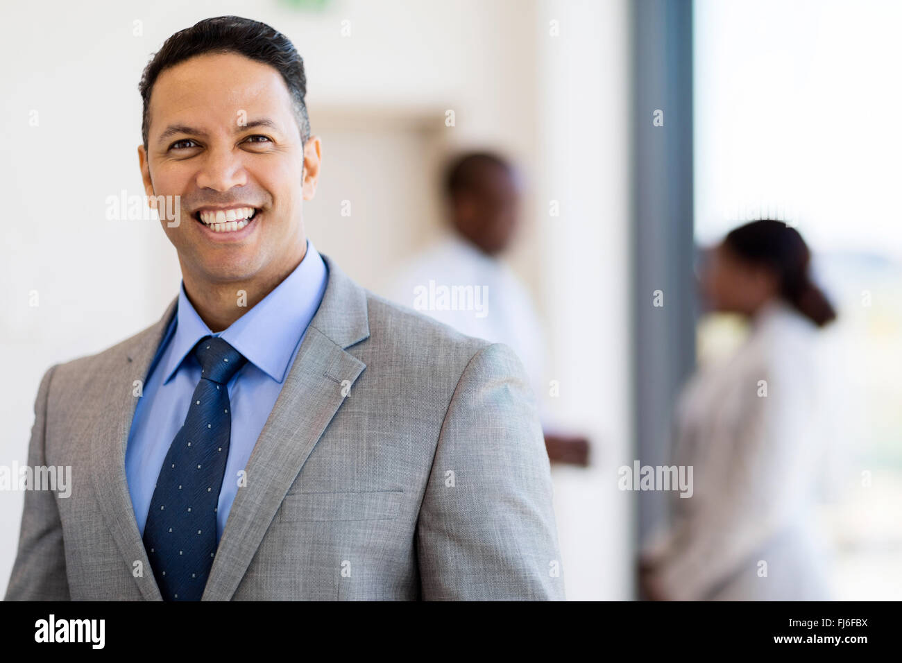 Buona ricerca età media business leader in office Foto Stock