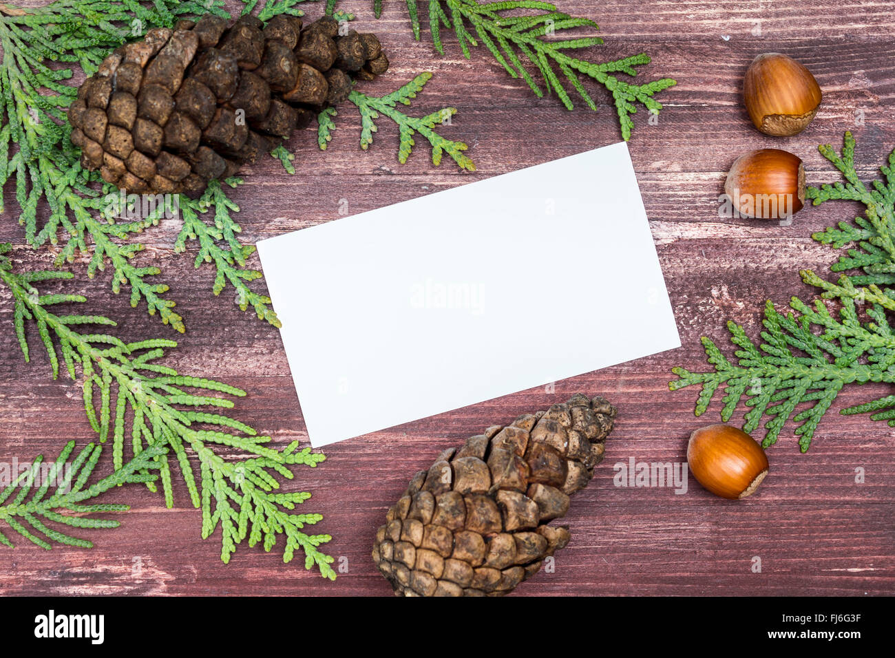 Scheda di natale su una tavola di legno Foto Stock