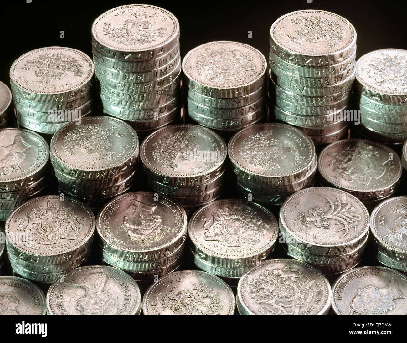 Pile di British pound monete, London, England, Regno Unito Foto Stock