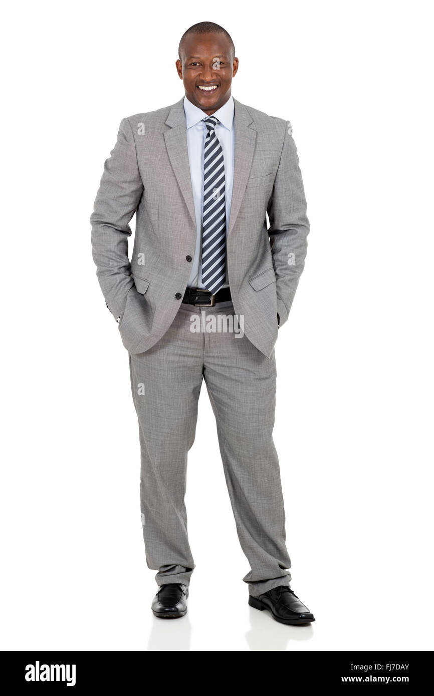 Felice African American businessman in piedi su sfondo bianco Foto Stock