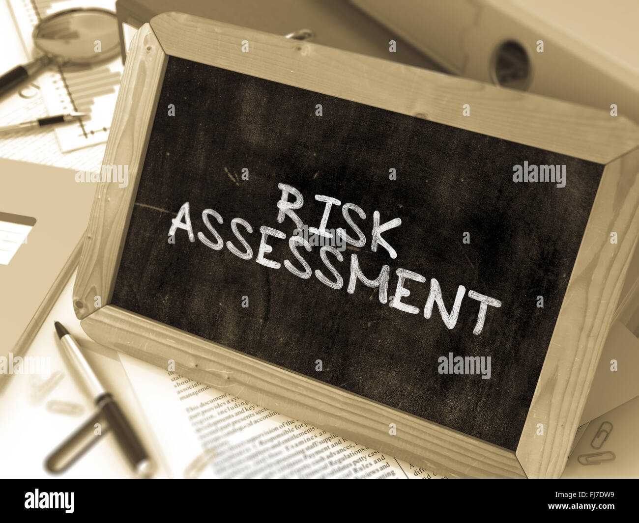 Manoscritta di valutazione del rischio su una lavagna. Foto Stock