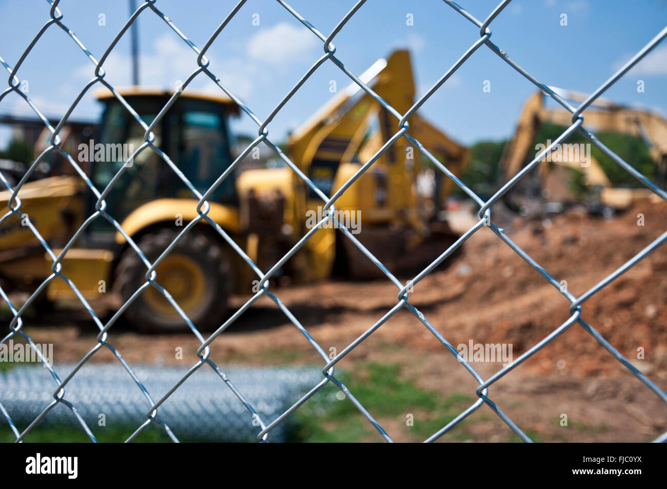 Catena di recinzione di collegamento al sito in costruzione Foto Stock