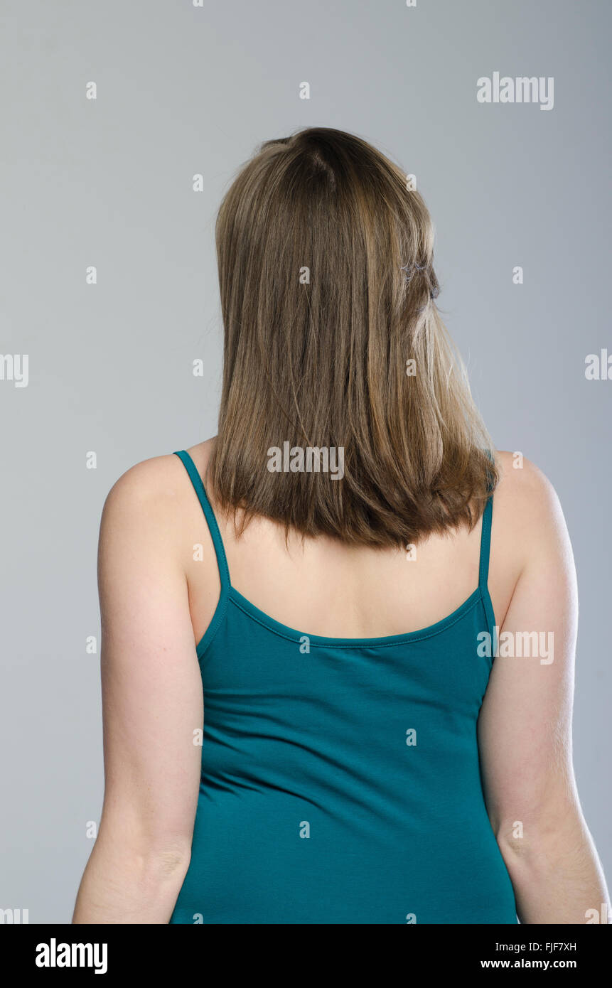Vista posteriore di una giovane donna Foto Stock