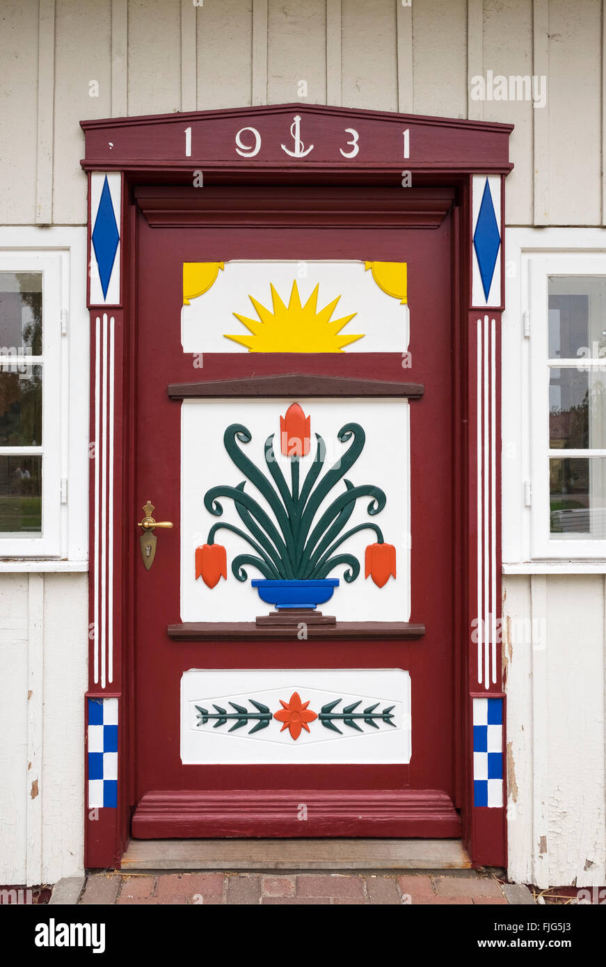 Tradizionalmente porte dipinte di un capitano della casa di Prerow, Darß, Fischland-Zingst, Mar Baltico, Meclemburgo-Pomerania Occidentale Foto Stock