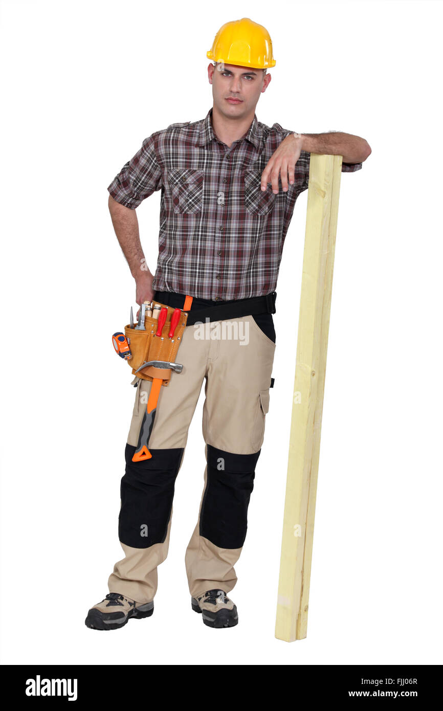 Fiducioso artigiano su sfondo bianco Foto Stock