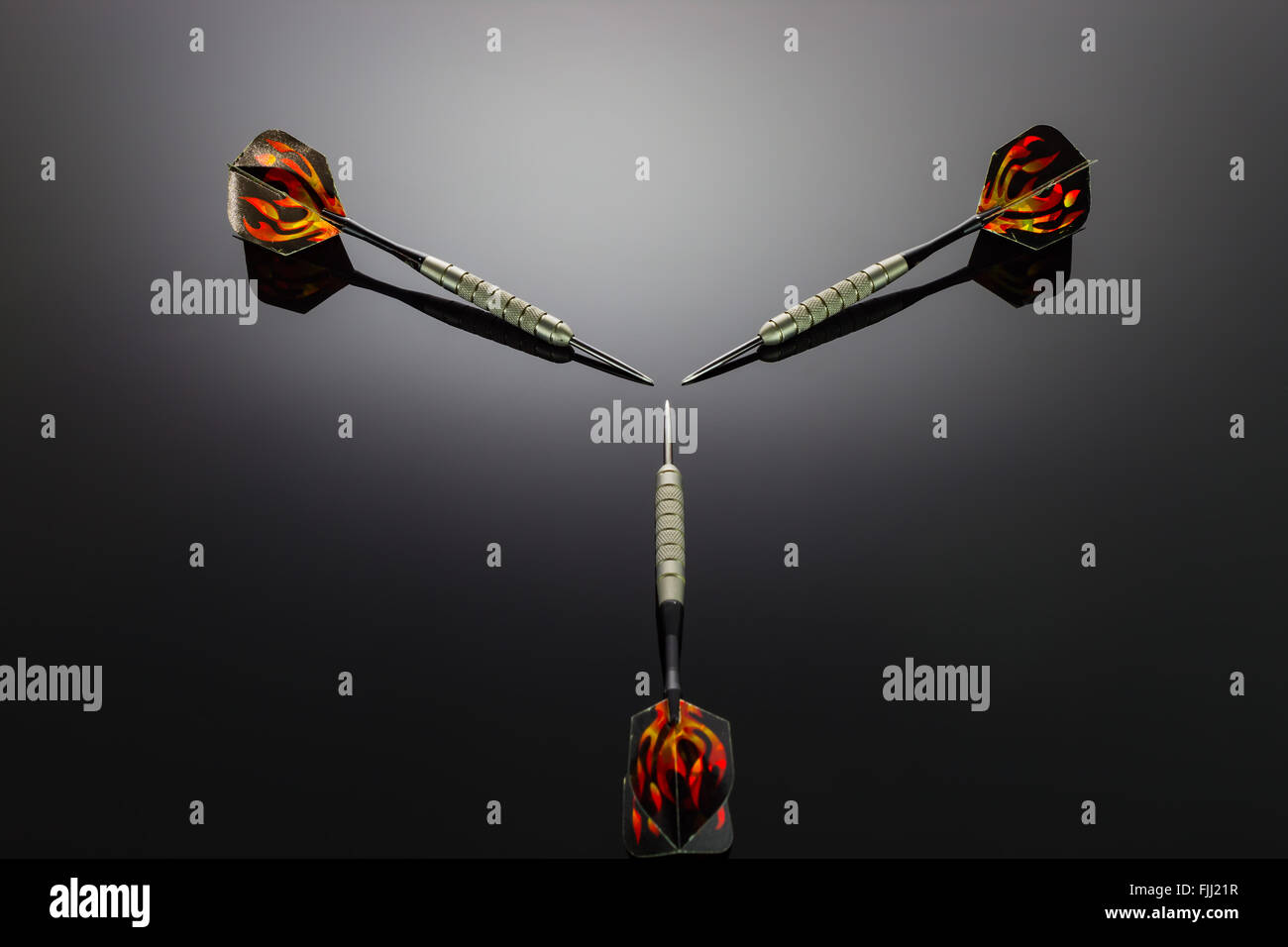 Arancione fiamma freccette del gioco Foto Stock