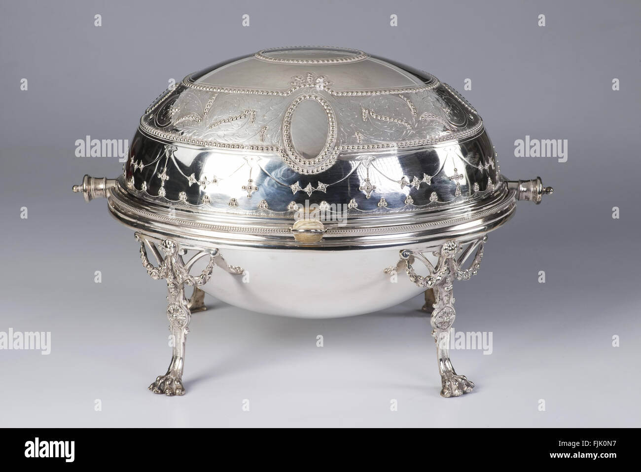 Antiquariato argento vittoriano colazione girevole server. Foto Stock