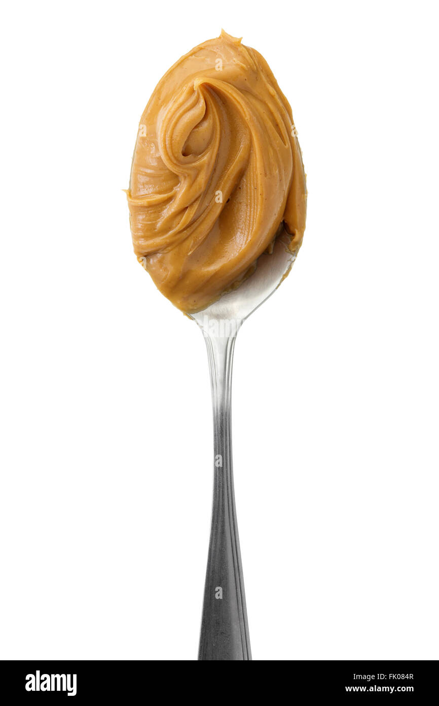 Crema di burro di arachidi in un cucchiaio Foto stock - Alamy