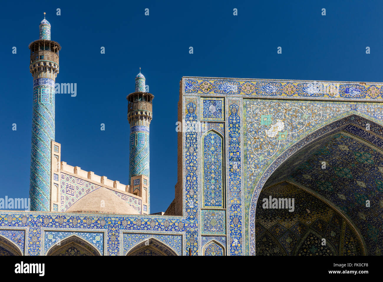 I minareti e piastrelle a mosaico pishtek coperto di Masjed-e l Imam (Imam moschea) vicino Imam Square, Isfahan, Iran Foto Stock