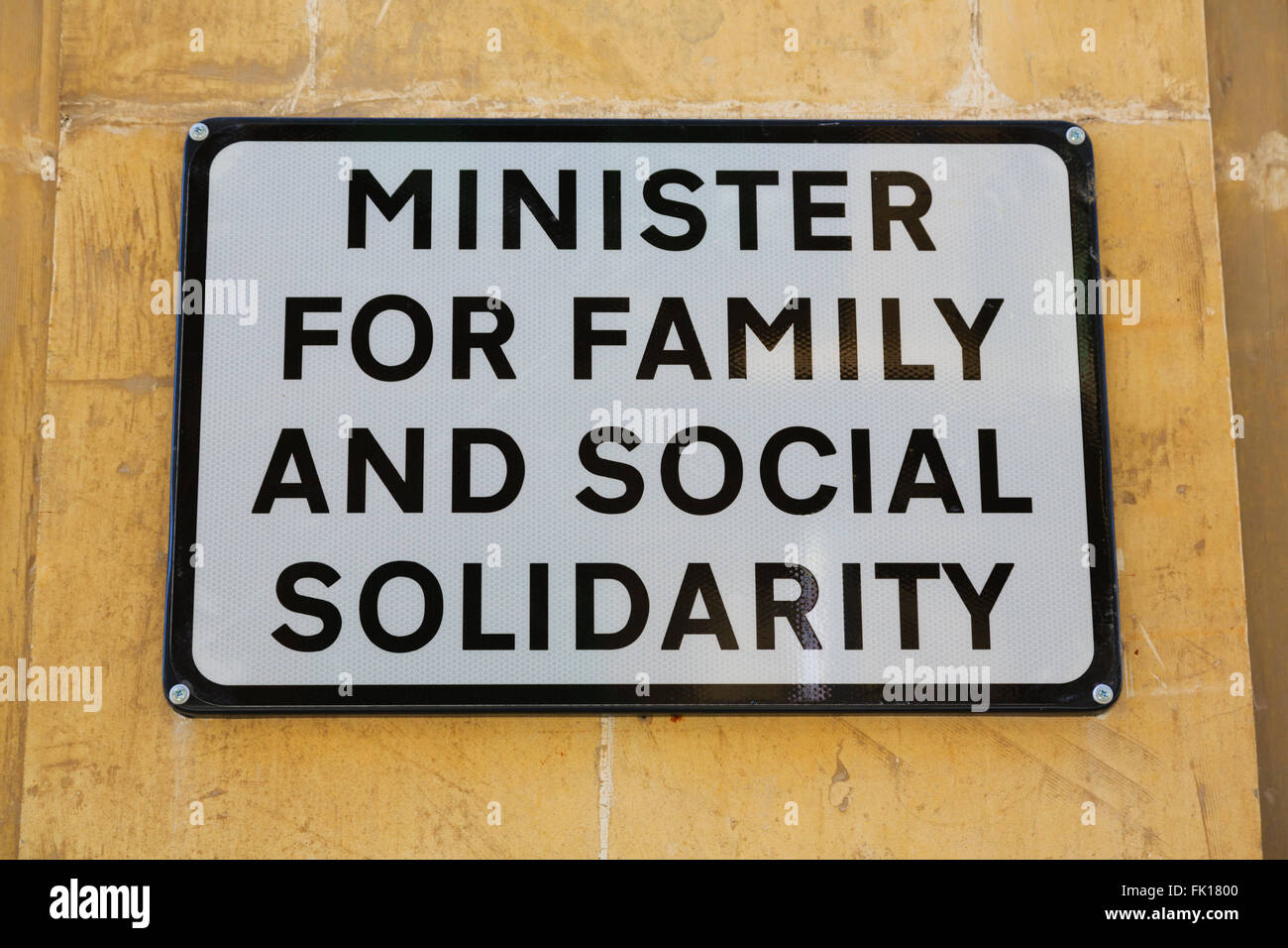 Parcheggio segno per il parlamento maltese Ministro per la famiglia e la solidarietà sociale, La Valletta. Foto Stock