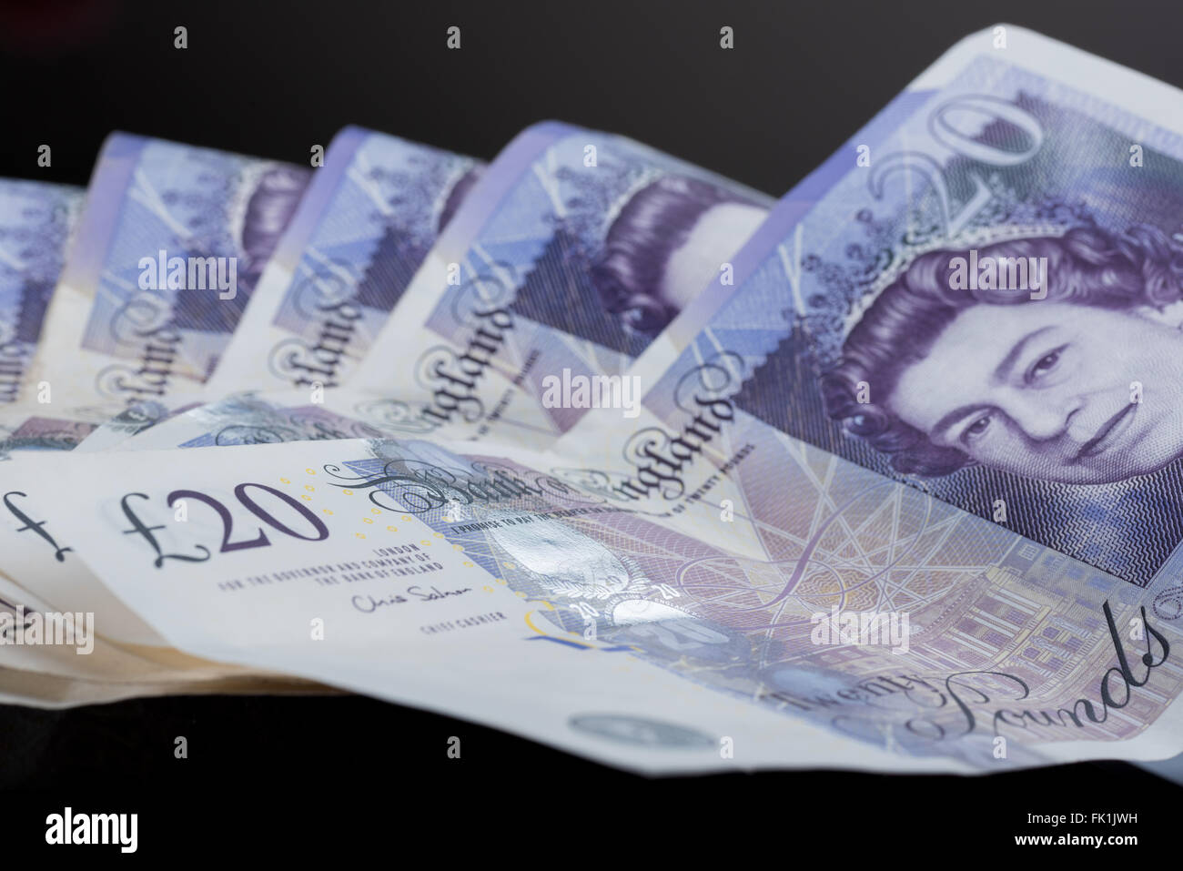 Una pila di 20 pound note Foto Stock