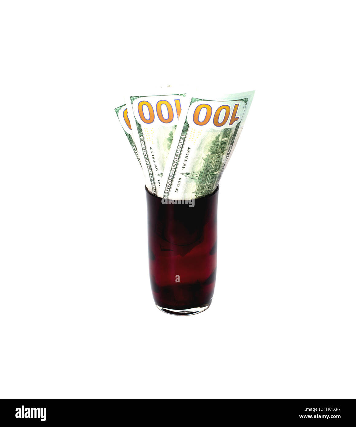 Il denaro in un vetro su uno sfondo bianco, a forma di fiore Foto Stock