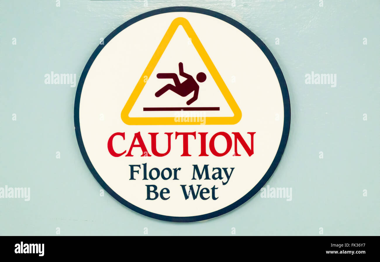Segnale di avvertimento pavimento bagnato Foto Stock
