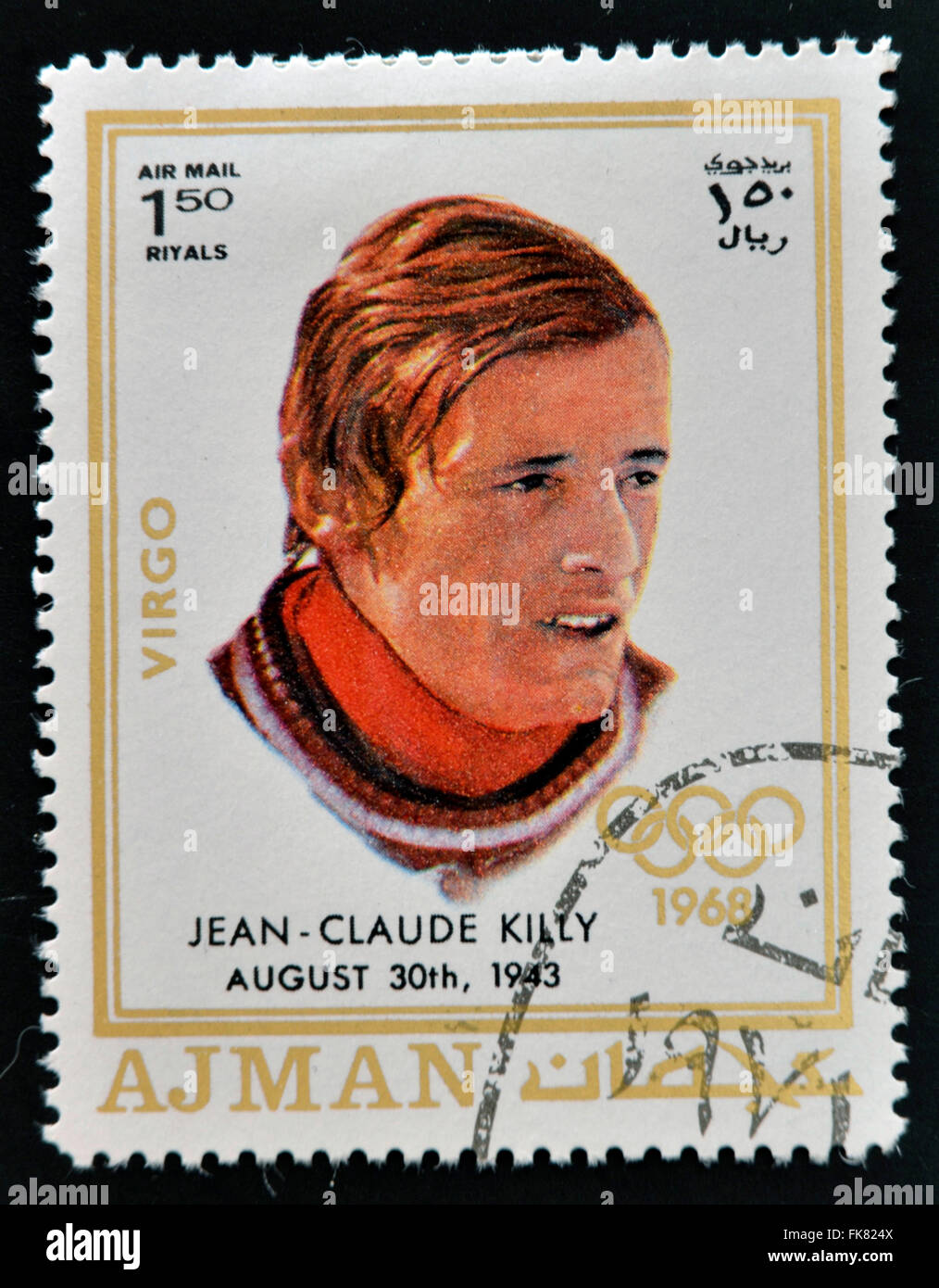 AJMAN - circa 1970: un timbro stampato in Ajman mostra Jean-Claude Killy, circa 1970 Foto Stock