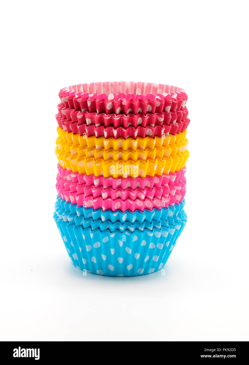 Pila di coloratissimi cupcake casi Foto Stock