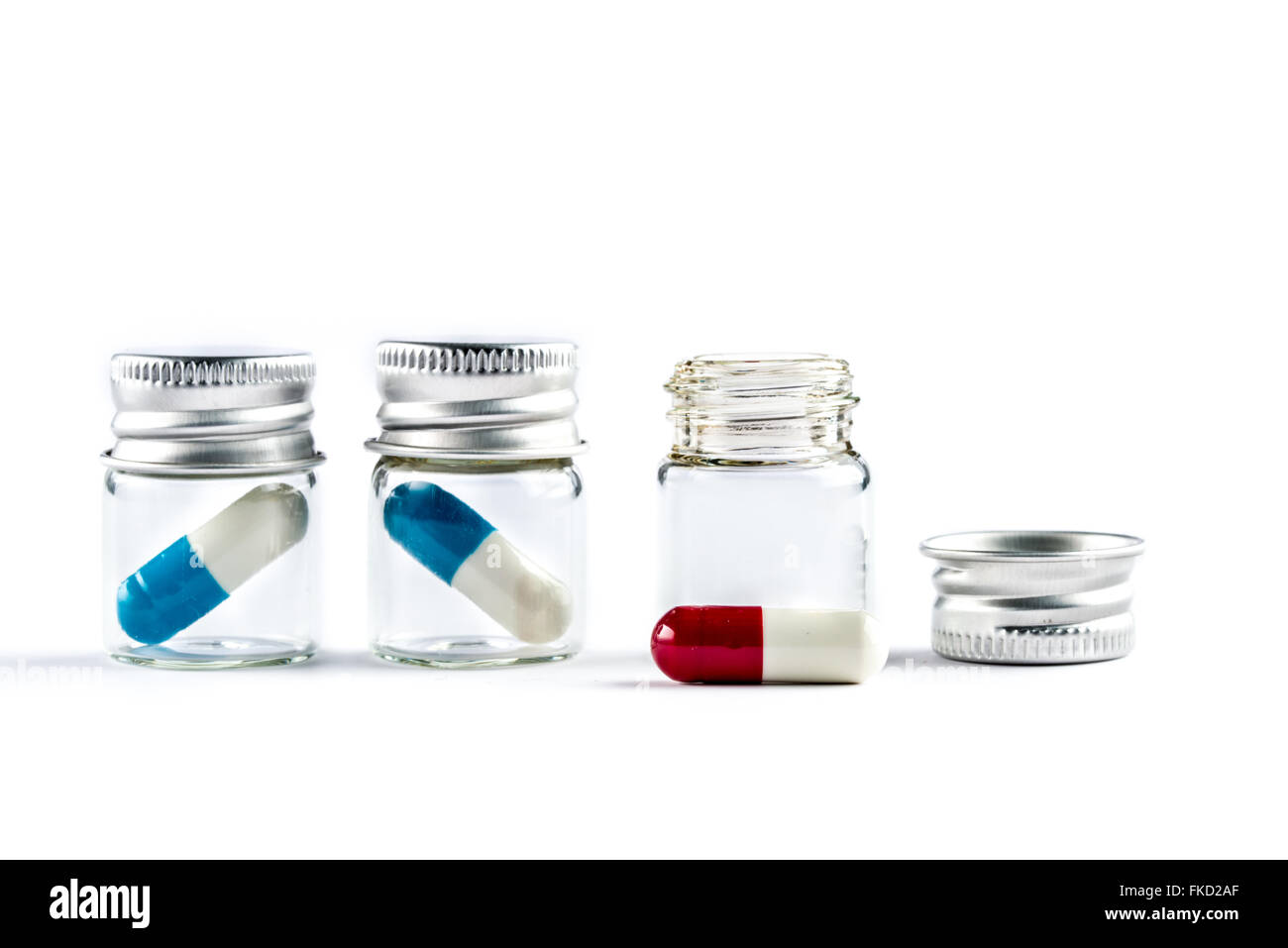 Capsule in bottiglia trasparente, la sanità e la medicina farmaco cura Foto Stock