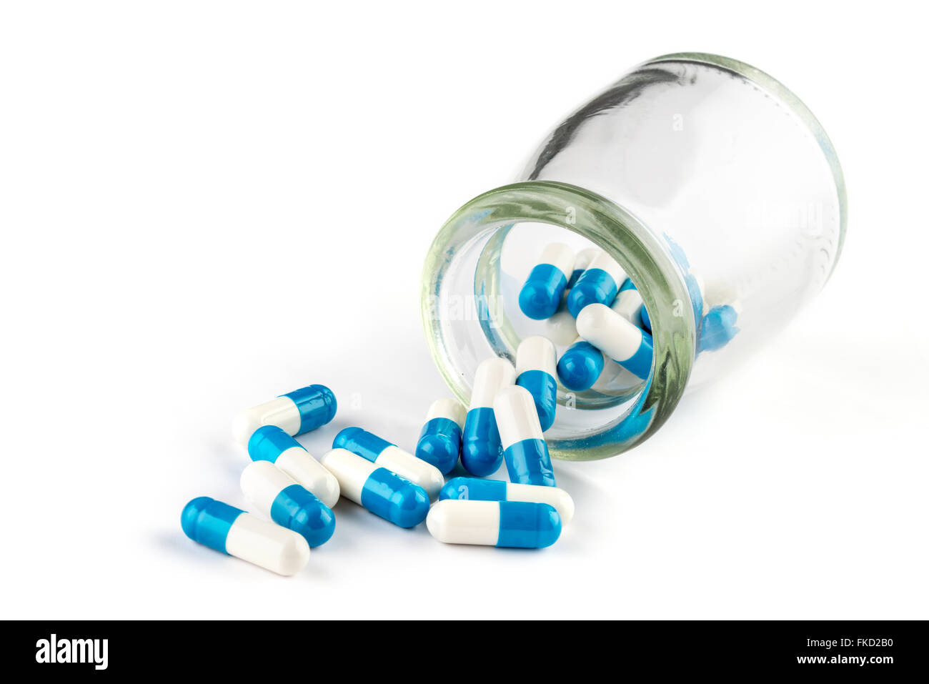 Capsule di colore blu con bottiglia trasparente, la sanità e la medicina farmaco cura Foto Stock