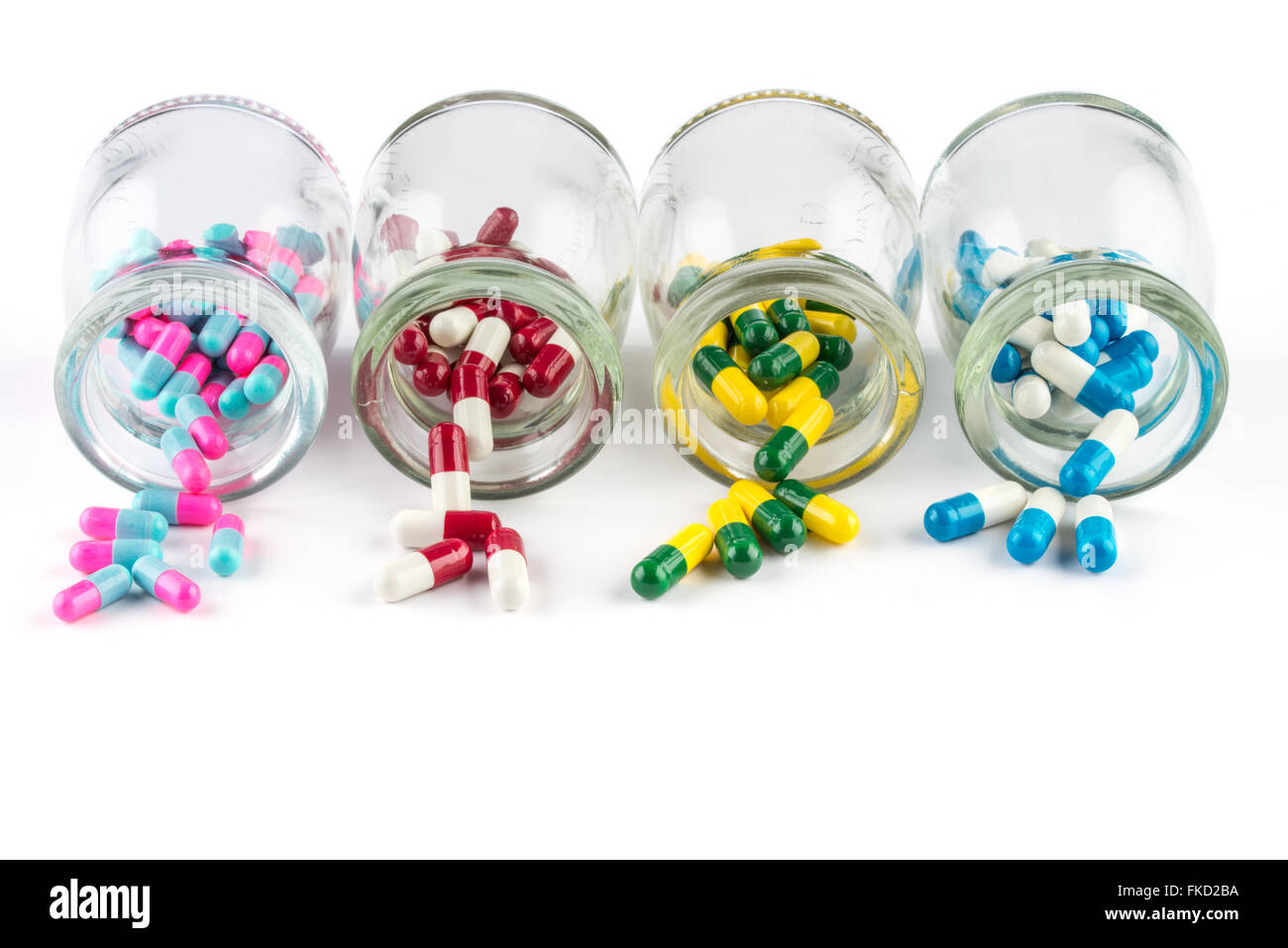 Capsula colorata in bottiglia trasparente, la sanità e la medicina medicinale healthcare Foto Stock