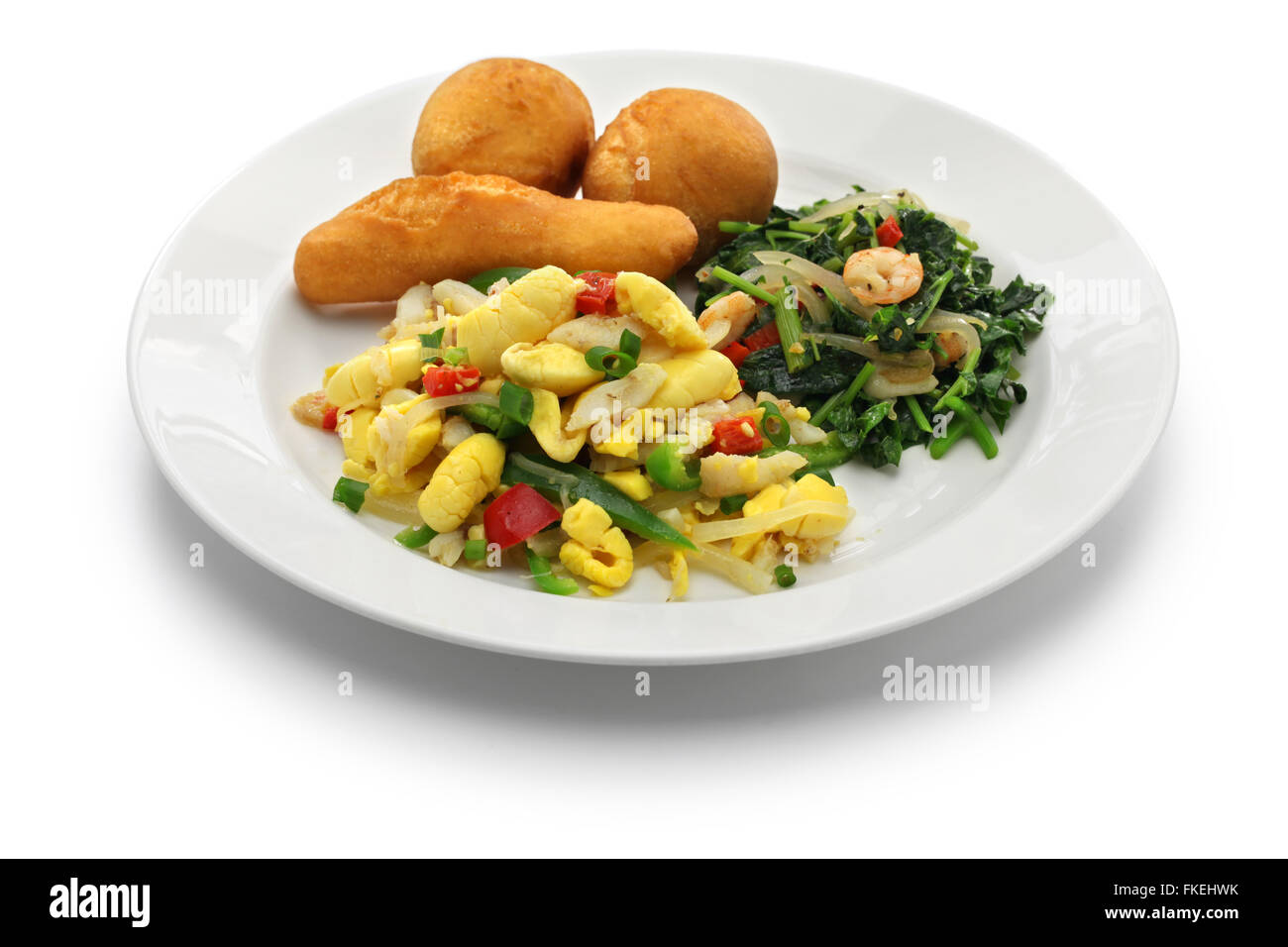 La prima colazione giamaicana, ackee e saltfish, callaloo, festival giamaicano Foto Stock