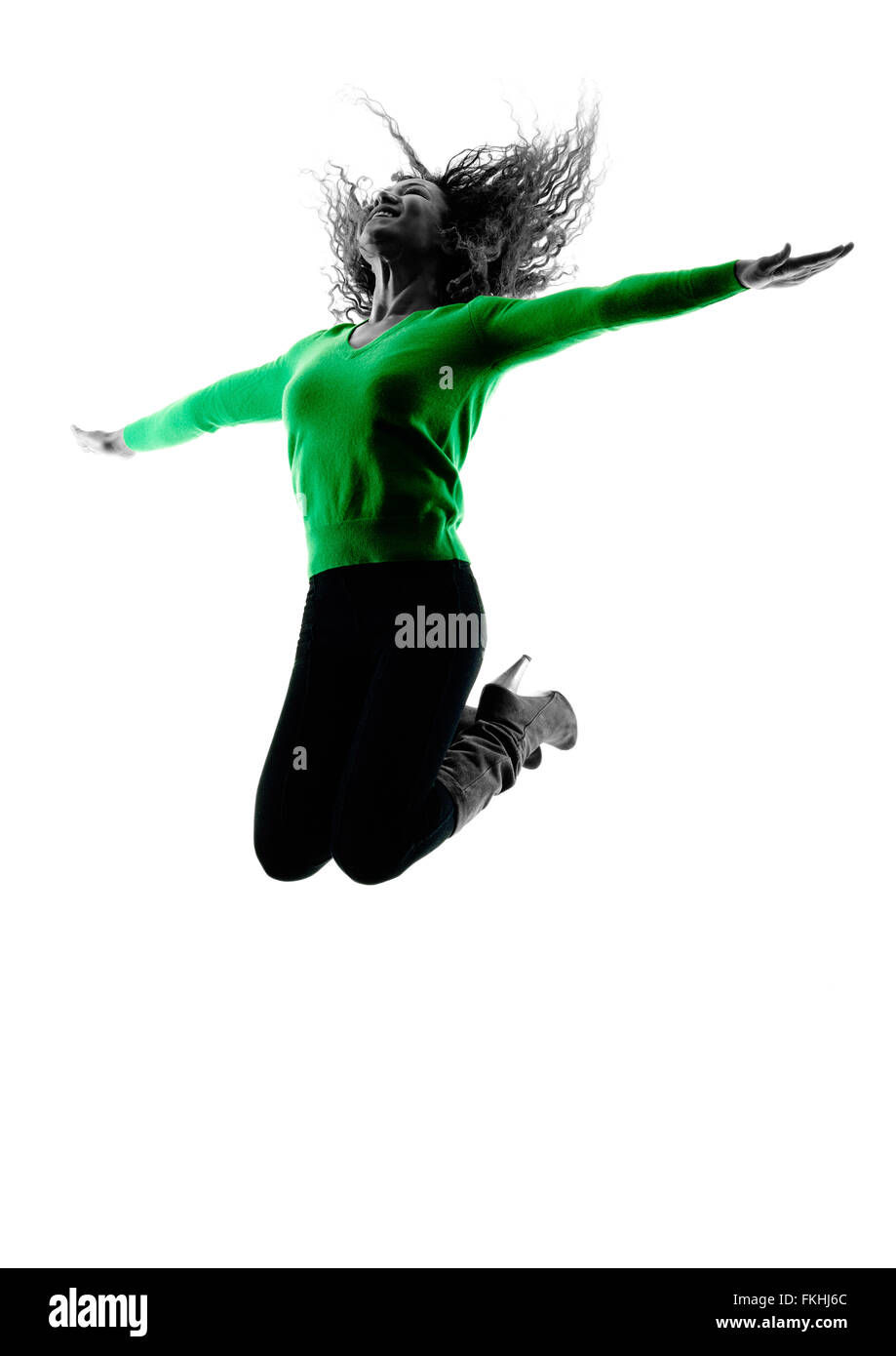 Una razza mista giovane donna jumping happy silhouette isolati su sfondo bianco Foto Stock