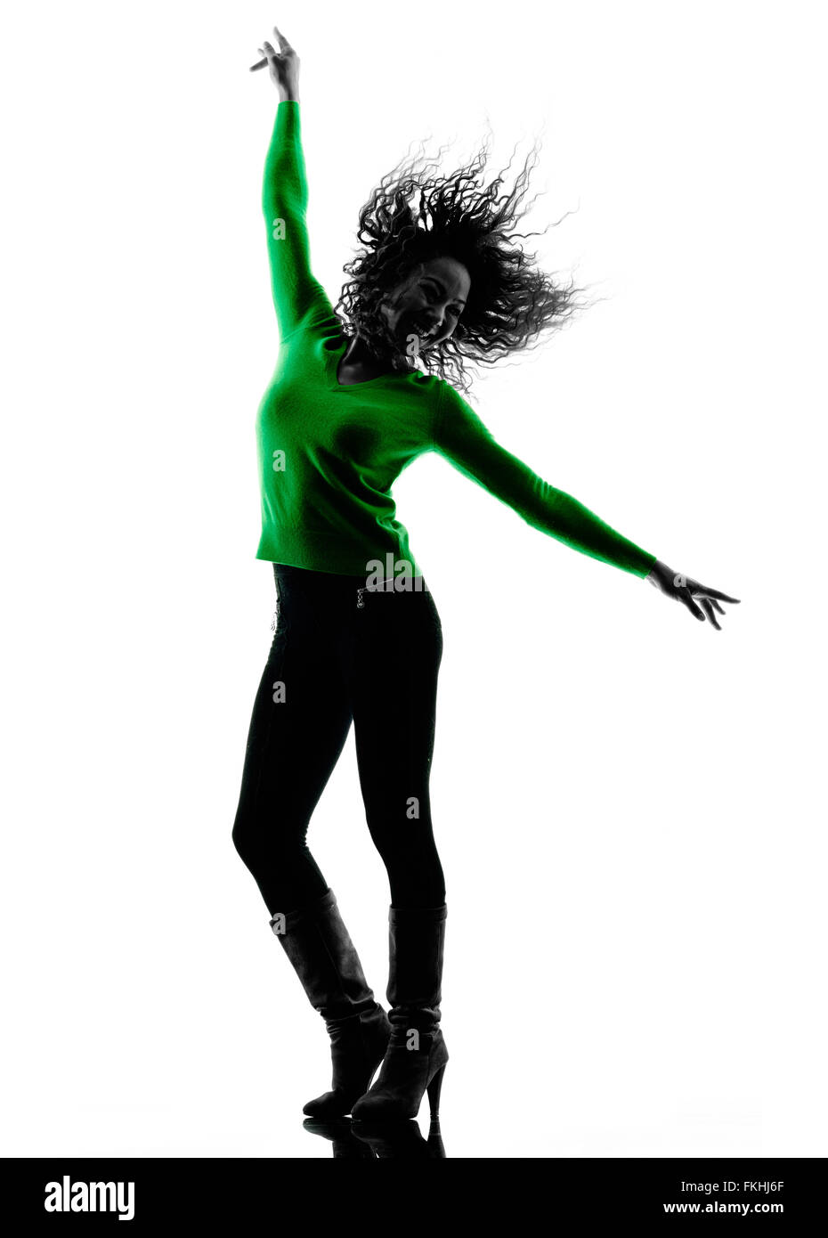 Una razza mista giovane donna Dancing silhouette isolati su sfondo bianco Foto Stock