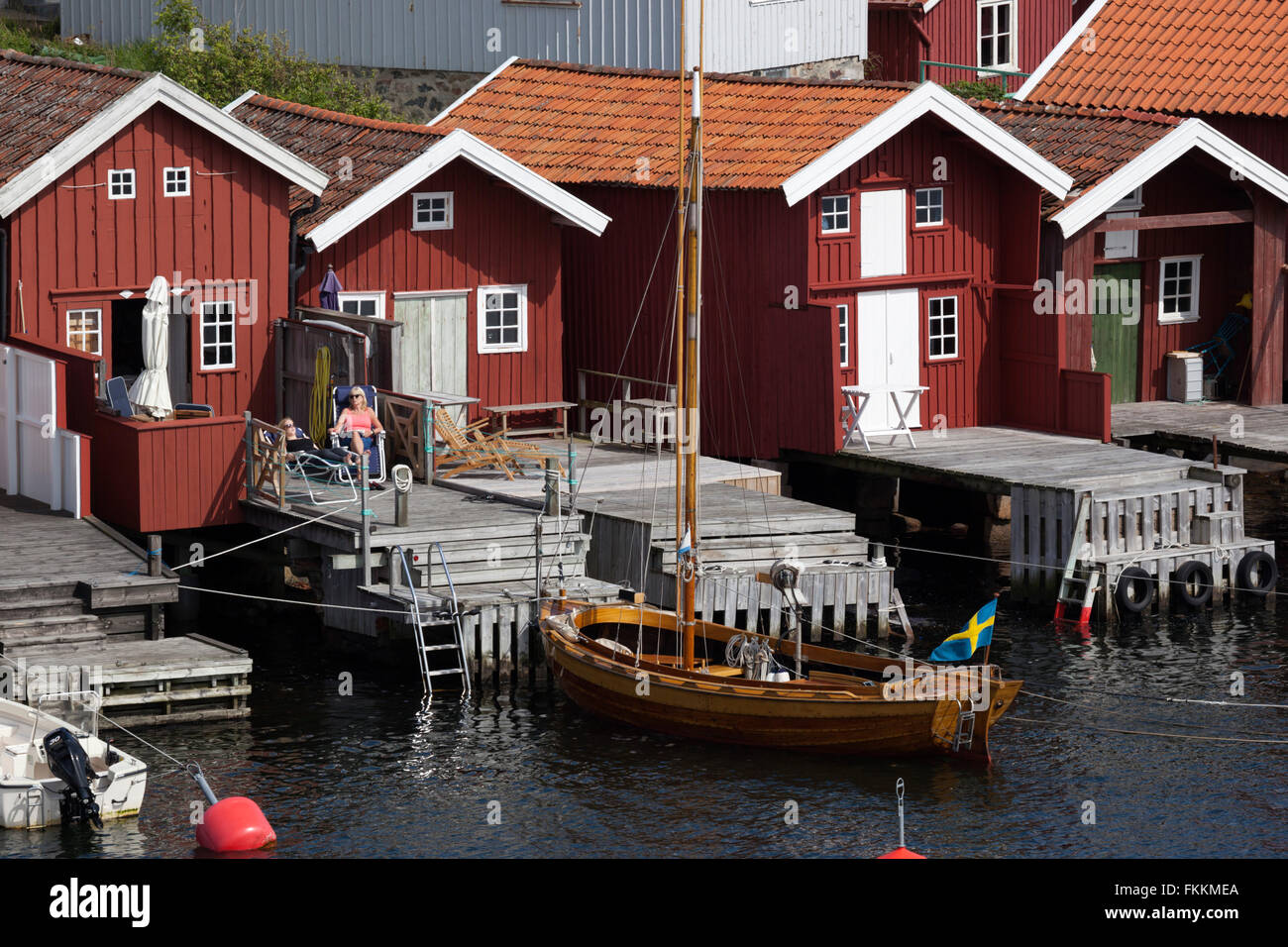 Tradizionale rosso falu case di pescatori, Hälleviksstrand, Orust, Bohuslän, sulla costa sud-ovest della Svezia, Svezia, Scandinavia, Europa Foto Stock