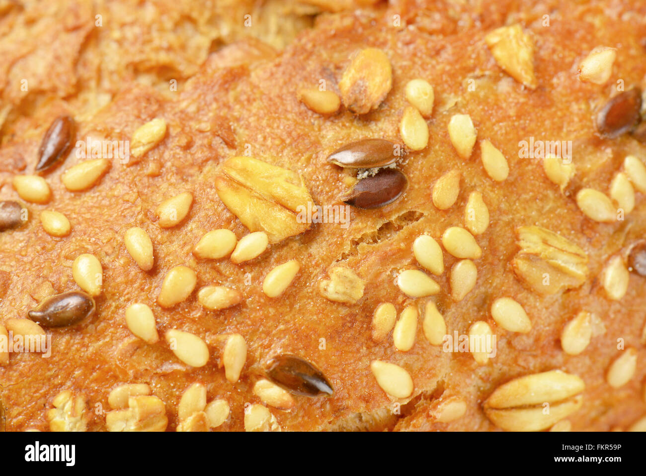 Dettaglio del panino con lino e di semi di sesamo Foto Stock