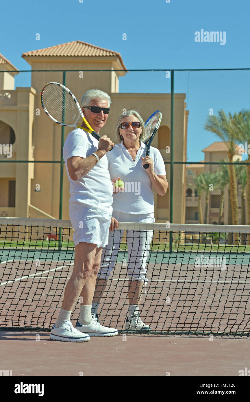 Coppia senior sul tennis Foto Stock