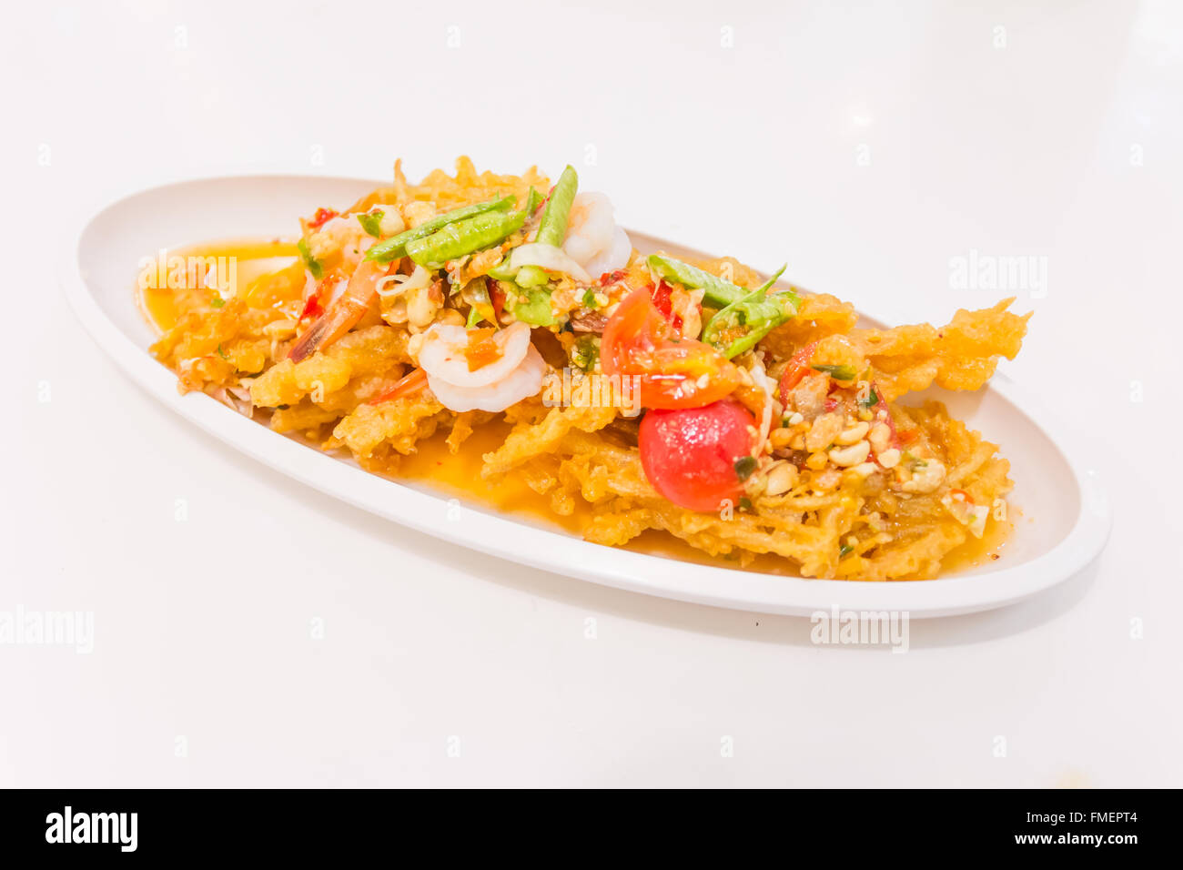 Cibo tailandese (Yum Sam Grob) : Croccanti pesce Maw in insalata piccante Foto Stock