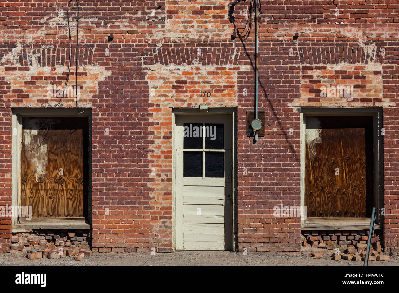 La parte anteriore di un vecchio edificio in mattoni nella città di Silver City, Nevada Foto Stock
