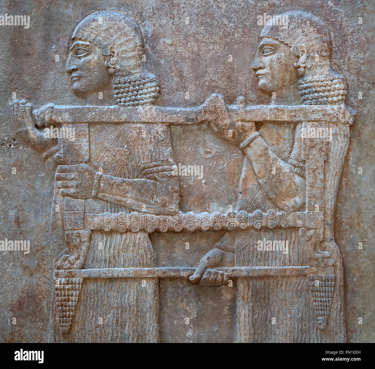 Antichi sumeri scultura in pietra con lo scripting cuneiformi Foto Stock