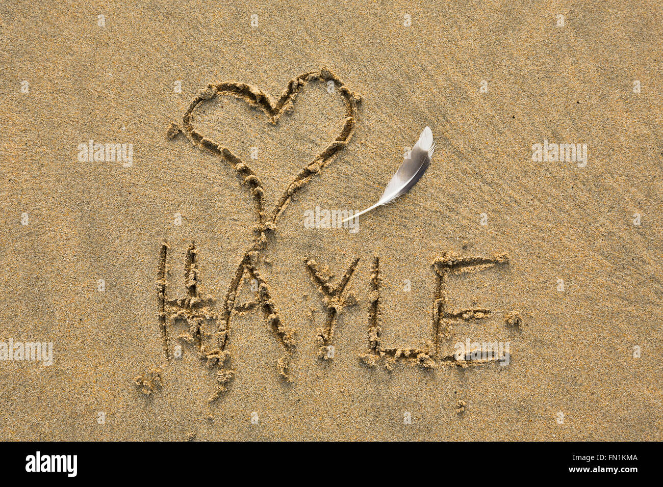 Hayle; Messaggio nella sabbia; Cornovaglia; Regno Unito Foto Stock