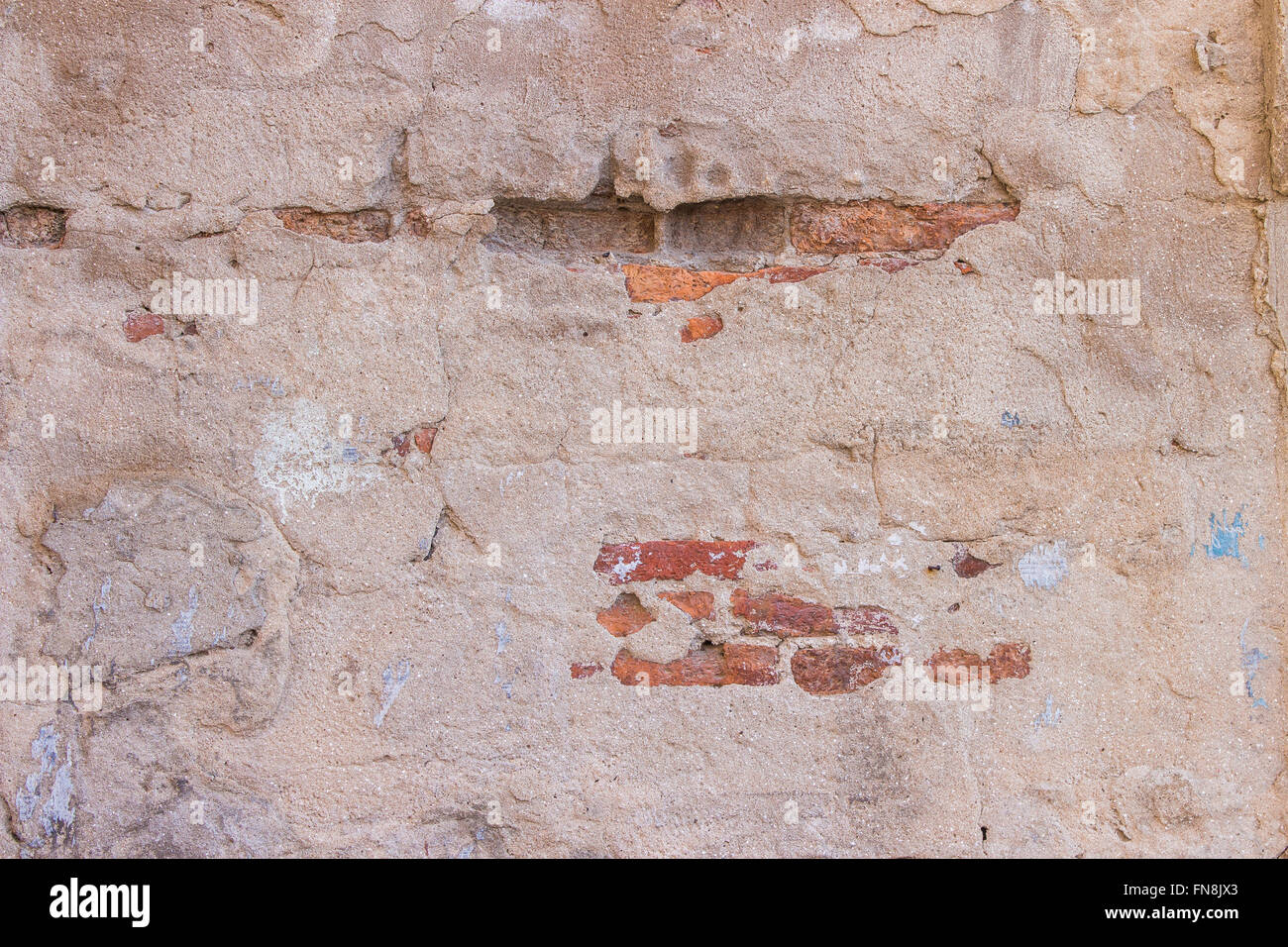 Il vecchio muro di mattoni in una immagine di sfondo Foto Stock