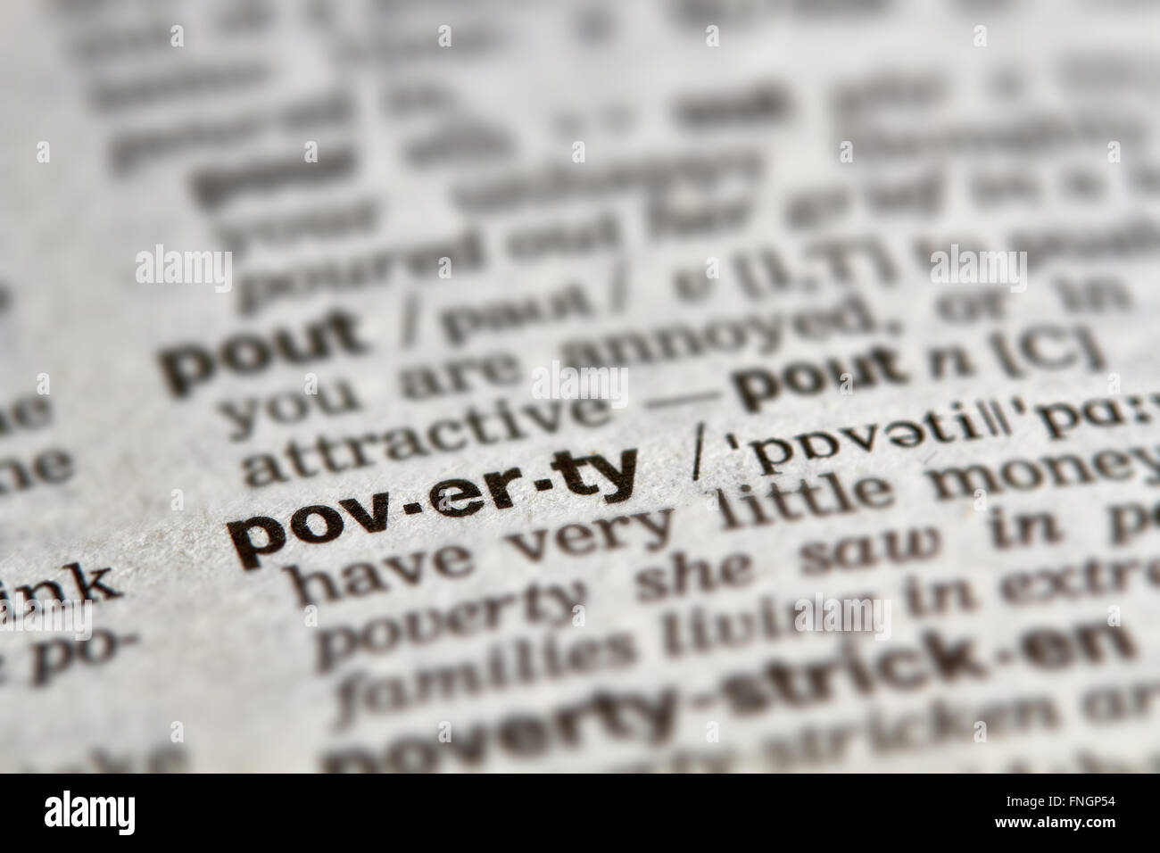 La povertà parola definizione testo nella pagina del dizionario Foto Stock