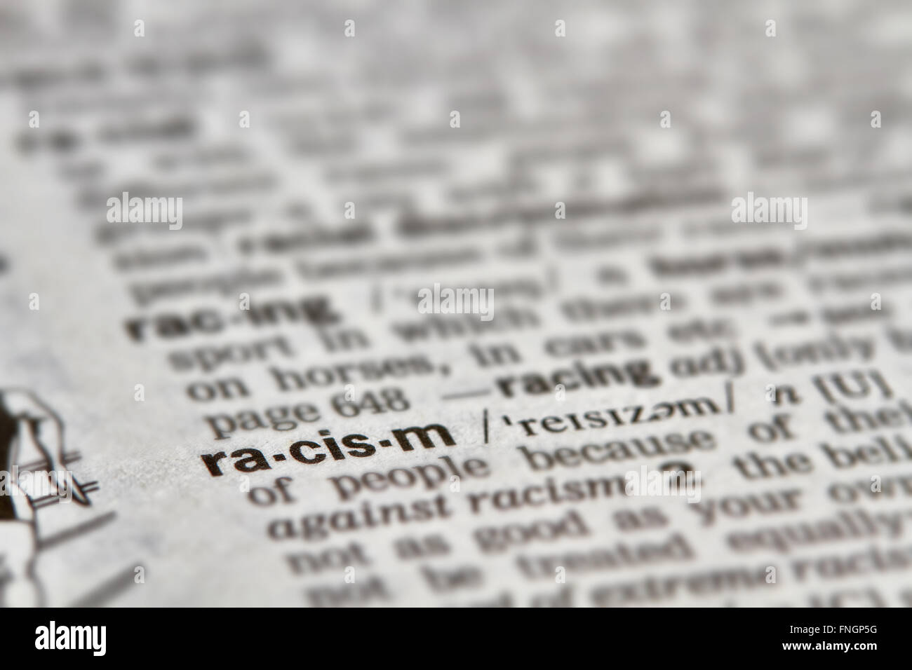 Il razzismo parola definizione testo nella pagina del dizionario Foto Stock